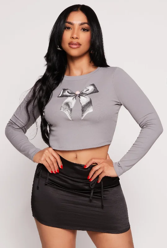 Almost Famous Bow Graphic Long Sleeve Crop Top